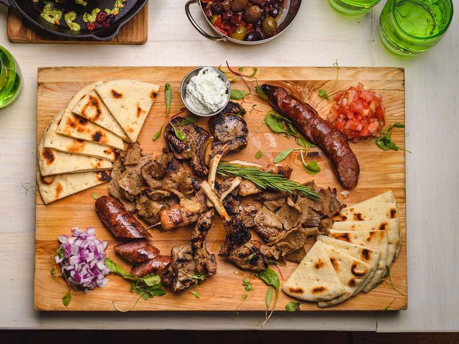 The Mediterranean Grille: Lollipop lamb chops, chicken skewers, gyro carvings and loukaniko (traditional village sausage).